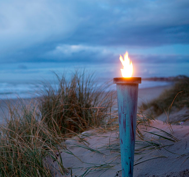 Fakkel på strand